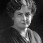 Portrait photographique de Maria Montessori jeune adulte, cheveux bouclés, regard calme et déterminéi